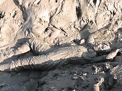 Filthy Mud Girl In Chest Waders Mucking Around