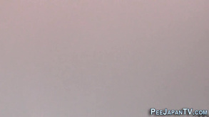 Japanese Hussy Pisses On The Street